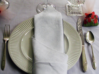Basic cream place setting with plated-silverware